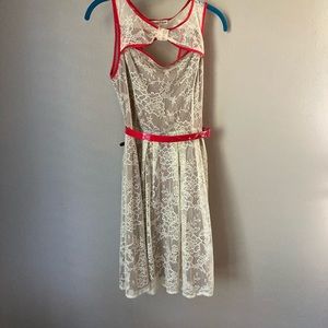 Vintage style ivory/beige lace dress with red trim